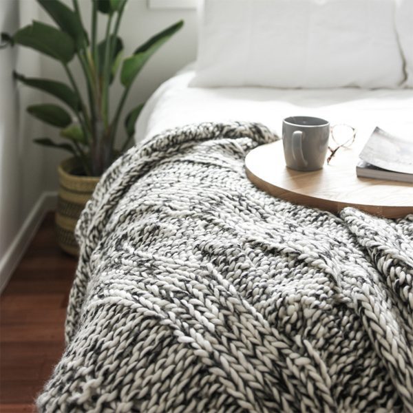 Claudette Chunky Knit Throw on bed with tea