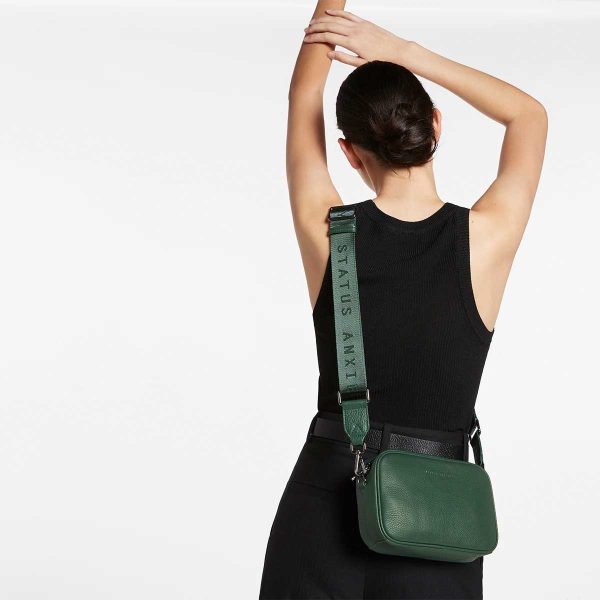 woman wearing status anxiety Green Plunder Bag