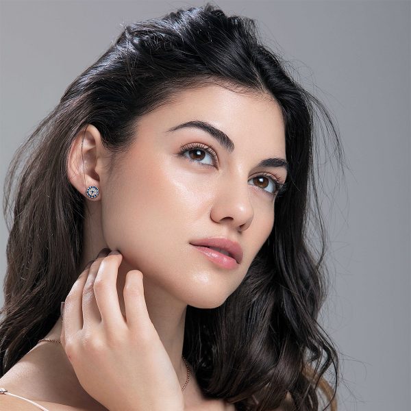 model with brown hair wearing Sundance Crystal Earrings