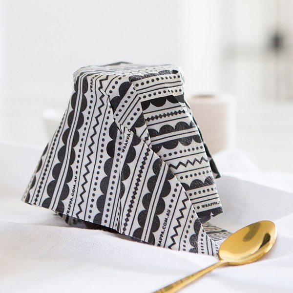 black and white food wrap over can
