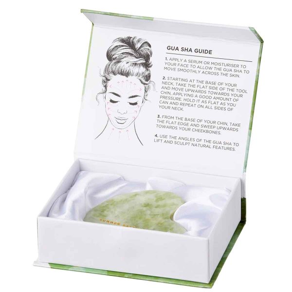 Crystal Gua Sha jade with packaging and instructions